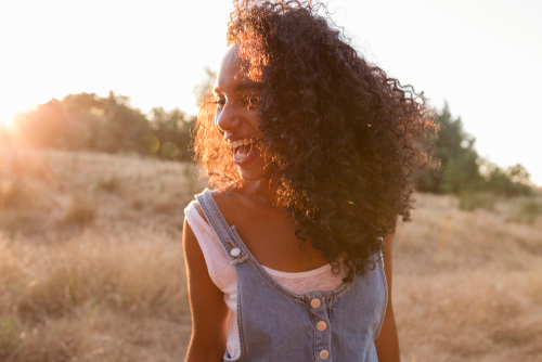 girl smiling after LASIK surgery