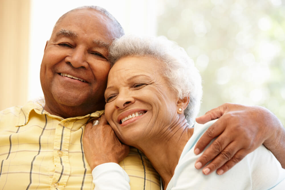 older couple smiling with each other