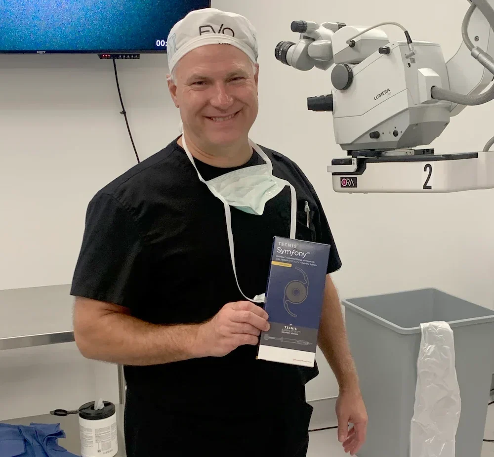 Kovach holding the Symfony Optiblue Lens