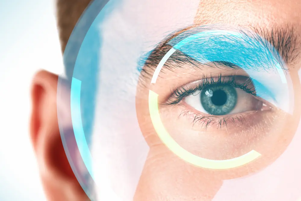 Close-up of male eye with HUD display